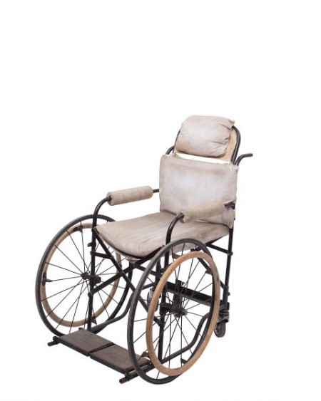 Period white fabric wheelchair